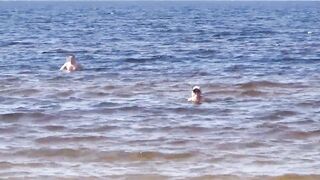 Nimble mature mommy has fun with young guys on the beach)))